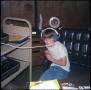 Photograph: [Young Patron Tries Out Library's New Audio Equipment]