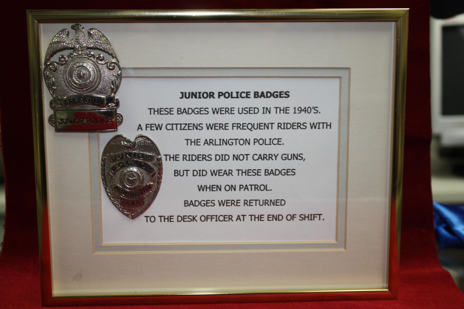 [Image of frame containing Junior Police Badges with description]
                                                
                                                    [Sequence #]: 1 of 1
                                                