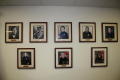 Photograph: [Image of a wall decorated with pictures of all the APD officers who …