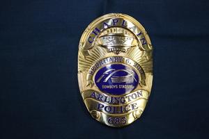 Primary view of object titled '[Image of an APD Chaplain Super Bowl badge, 2011]'.