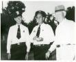 Primary view of [Arlington Police Officers Howard Vaughan and G.A. Coke with Ed Pummill, 1950]