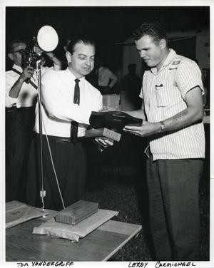 Primary view of object titled '[Arlington Mayor Tom Vandergriff presenting Detective LeRoy Carmichael an award]'.