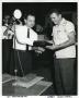 Thumbnail image of item number 1 in: '[Arlington Mayor Tom Vandergriff presenting Detective LeRoy Carmichael an award]'.