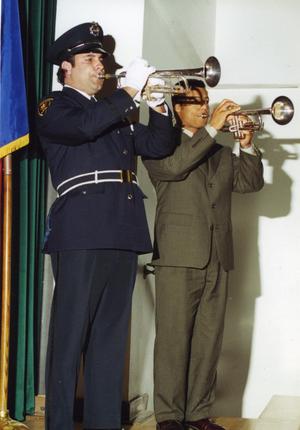 Primary view of object titled '[Arlington Police Officer Ray Hosack Playing "Taps"]'.