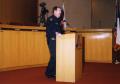 Thumbnail image of item number 1 in: '[Arlington Police Officer Dee Anderson speaking in city council chamber room]'.