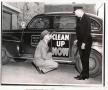 Thumbnail image of item number 1 in: '[Arlington Police Commissioner Joe Elder and Fire Chief Mike Thompson, 1948, "Clean Up Now" campaign, name and date on photo]'.