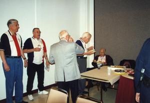 Primary view of object titled '[Arlington Citizens Police Academy alumni gathering for refreshments]'.