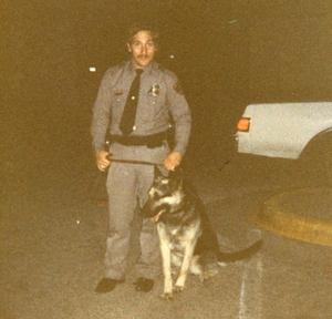 Primary view of object titled '[Arlington Canine Officer Joe Oakley with Rogue]'.