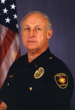 Primary view of object titled '[Arlington Police Deputy Chief Danny Sustaire, portrait 2002]'.
