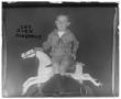 Thumbnail image of item number 1 in: '[Portrait of Boy on Rocking Horse]'.