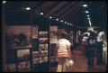 Photograph: [People Walk Through An Exhibit at Fayette Public Library]
