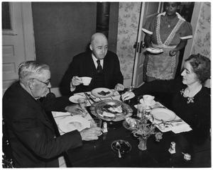 Primary view of Photograph of Sam Rayburn Eating Breakfast