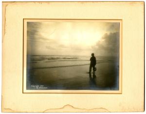 Primary view of object titled 'Photograph of man on beach'.