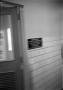 Photograph: [A door and hallway at Parkland Hospital]