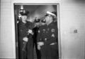 Photograph: [Dallas Police officers at Parkland Hospital on November 24, 1963]