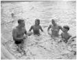 Primary view of [Wally Pryor instructing teenagers in Deep Eddy swimming pool]