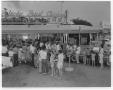 Photograph: [Customers in front of Kentucky Fried Chicken stand]