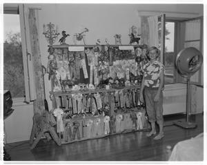Primary view of object titled '[Terry Jo Cocke with trophies and ribbons]'.