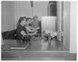 Photograph: [Women working with phone switchboard]