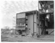Photograph: [Construction on exterior of power plant]