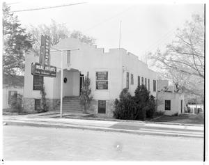 Primary view of object titled '[The exterior of the Andy Anderson Insurance building]'.