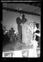 Primary view of [Photograph of a Man at a Podium]