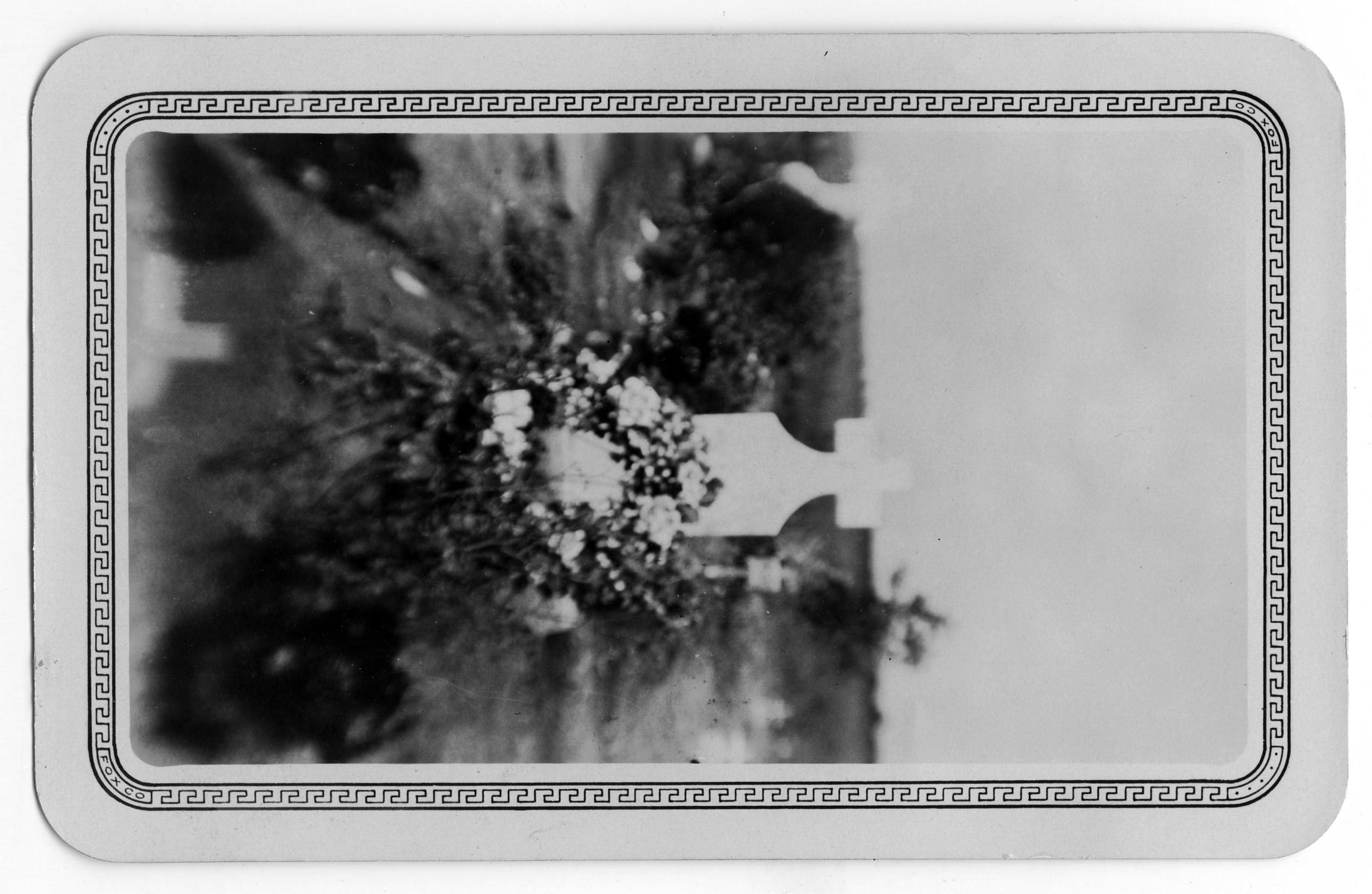 Tombstone with Flowers
                                                
                                                    [Sequence #]: 1 of 2
                                                