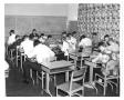 Thumbnail image of item number 1 in: 'Students in classroom inside Kramer Hall'.