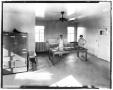 Primary view of Two women standing next to table in Kilian Hall kitchen