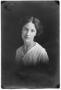 Photograph: [Portrait of Woman in White Top]