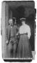 Photograph: [Man and Woman in Doorway]