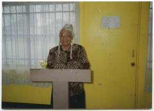 Primary view of object titled '[Dorothy Ingram at Podium]'.