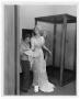 Photograph: [Two Women Dressing Mannequin]