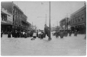 Primary view of [Crowd Standing in Flood Waters]