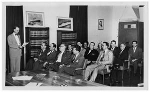 Primary view of object titled '[Group in Chamber of Commerce]'.