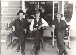 Primary view of object titled '[Some Gentlemen in Front of the Oxford Hotel]'.