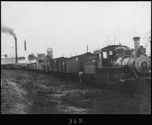 Primary view of object titled '[Texas South-Eastern Railroad Lumber Freight Train]'.