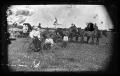 Photograph: [Group of people in a field]
