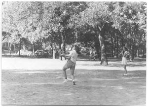 Primary view of [Photograph of Girls Playing Softball in Reverchon Park]