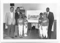 Photograph: [Photograph of a Group of People With Plans for a Rangers Ballpark]