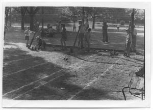 Primary view of [Photograph of a Bowling Game in Reverchon Park]