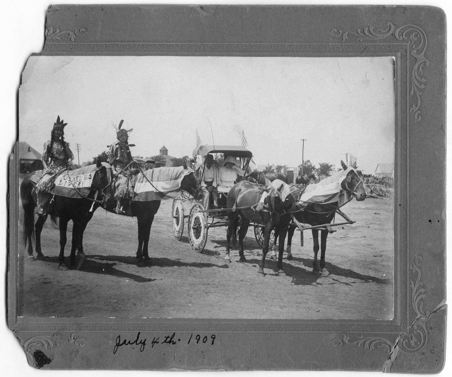 [Buggy and two horses in parade]
                                                
                                                    [Sequence #]: 1 of 2
                                                
