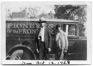 Primary view of object titled '[Fleet and Etha Pruden standing in front of truck]'.