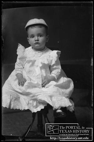 Primary view of object titled '[Toddler boy in a white gown]'.