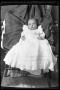 Photograph: [Baby in a long white gown]