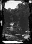 Photograph: [River scene with a waterfall and mill]
