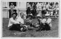 Thumbnail image of item number 1 in: '[Ruth Roach sitting in the grass with friends]'.