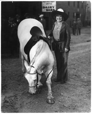 Primary view of object titled 'Ruth Roach With Her Horse "Silver Lady" Bowing'.