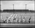 Thumbnail image of item number 1 in: '[Denton Teacher's College marching band poses on football field]'.