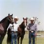 Primary view of [Shorty and Bill Freeman with Horses]